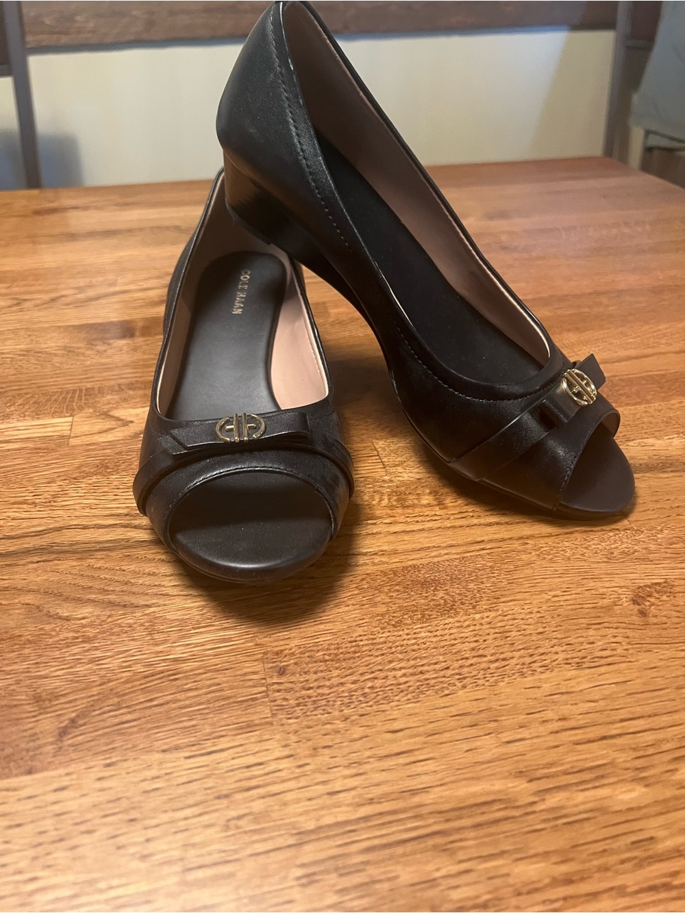 Cole Haan Black Peep-Toe Heels with Gold Logo Accent